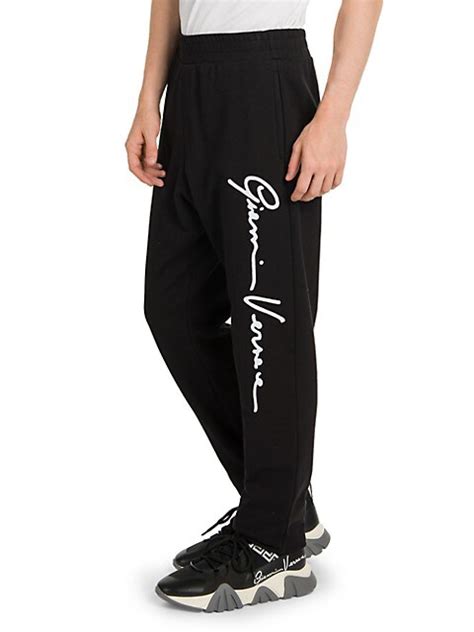 Shop Versace Gianni Versace Script Joggers 